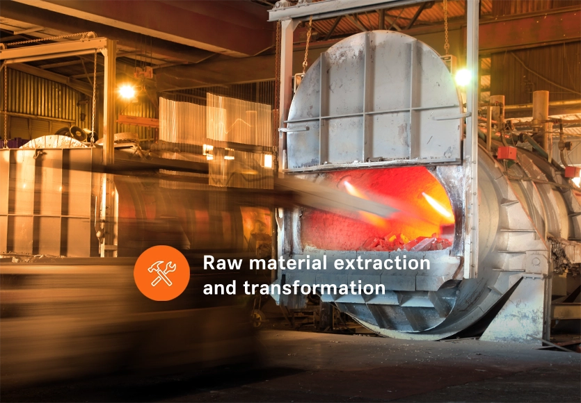 An open industrial furnace with glowing material inside, labelled “Raw material extraction and transformation".
